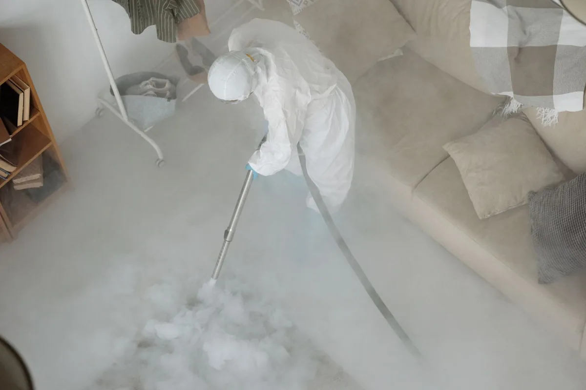 Biohazard cleanup technician in protective equipment, Salem, UT